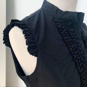 Miss Selfridge bought at Top Shop London early 2000’s.  Button up ruffle shirt